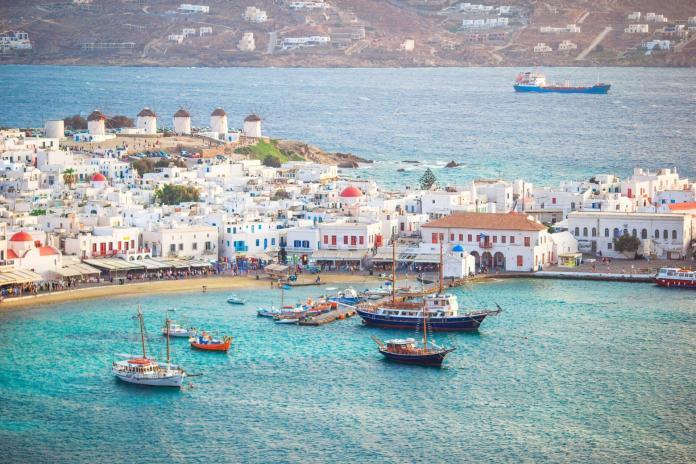 View of traditional greek village with white houses on Mykonos Island, Greece