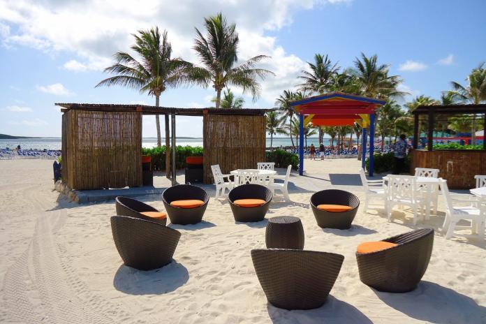 Outdoor seating living space on a tropical island in the Bahamas, Caribbean ocean, at the beach.