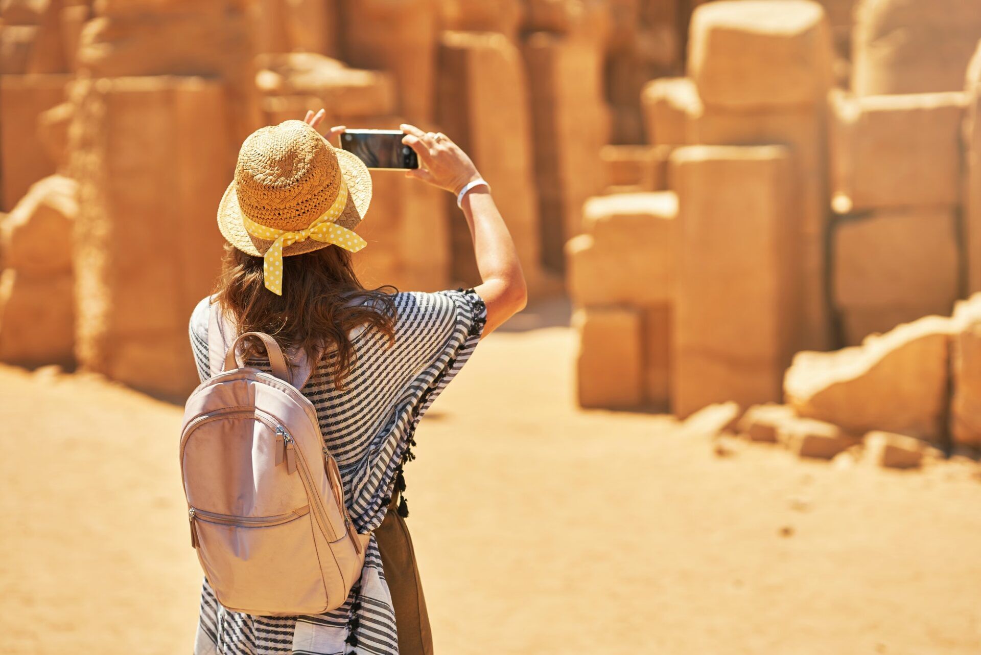 Tourist woman in Karnak Temple in Luxor Egypt