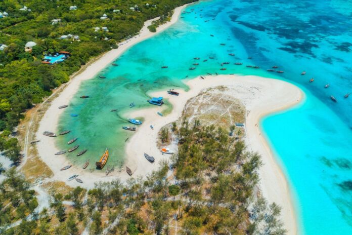 Aerial view of the fishing boats on tropical sea coast