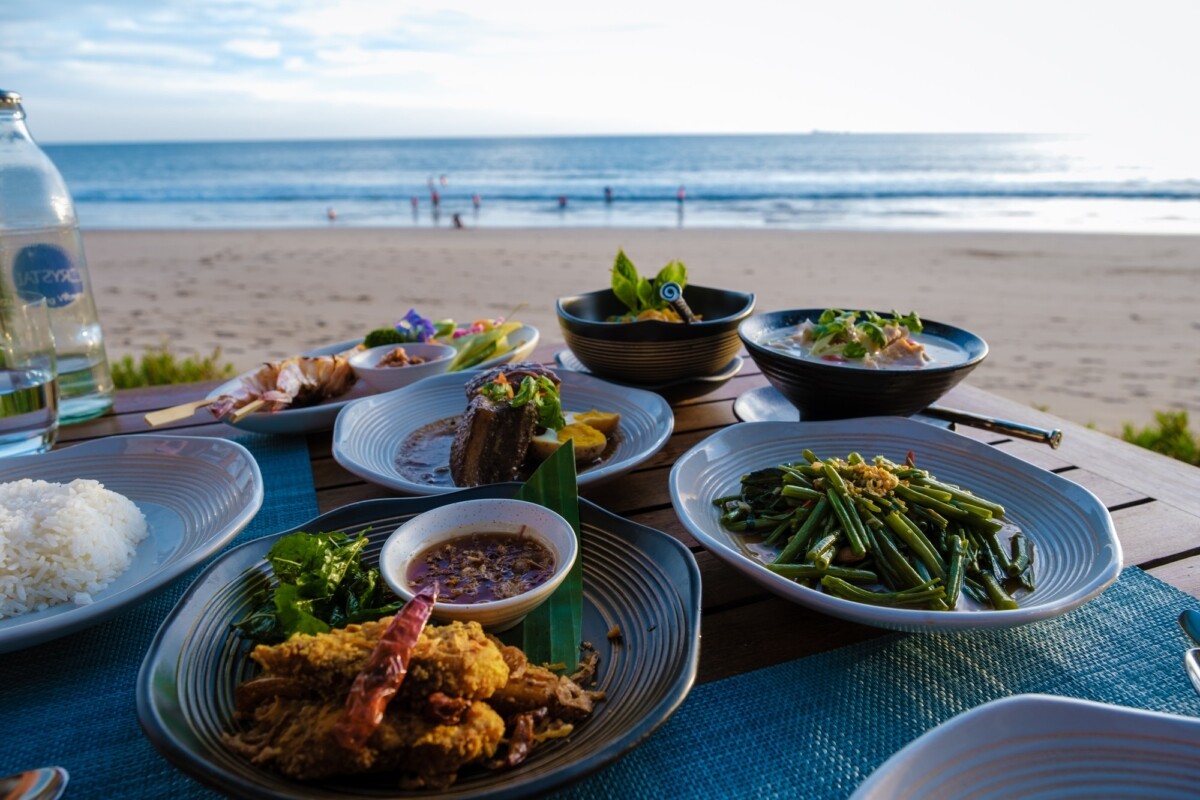 Thai food on a table on the beach in Thailand