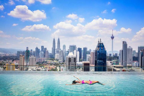 Swimming-pool-on-roof-top-with-beautiful-city-view-kuala-lumpur-malaysia-shutterstock_410063323-1