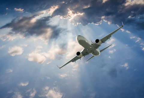 passenger-airplane-in-the-clouds.-travel-by-air-transport-samolot-shutterstock_294615899