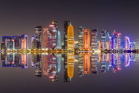 Doha-skyline-night-scene---The-Capital-City-of-Qatar-shutterstock_265654901