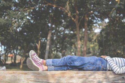 Feet-of-young-girl-sleep-in-the-park-on-nature-Relax-time-on-holiday-shutterstock_536419960-2
