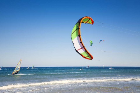 0.-kitesurfing-background-shutterstock_163578671