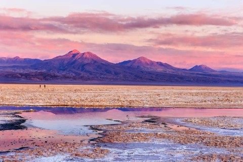 Small-lagoons-in-foreground-and-mountains-in-background.-It-was-a-colorful-sunset-on-Salar-de-Atacama-Atacama-Chile-shutterstock_538031434
