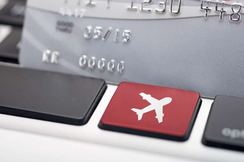 Online-flight-booking-icon-button-of-a-computer-keyboard-shutterstock_116422108